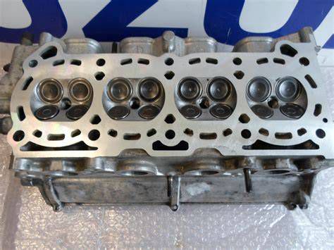 Suzuki Swift 1.0 motor hengerfej és dugattyú