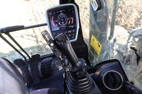 Kotrógép GPS rendszerrel a terepen