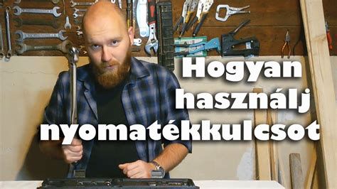Nyomatékkulcs használata gyújtógyógyertya beszereléséhez