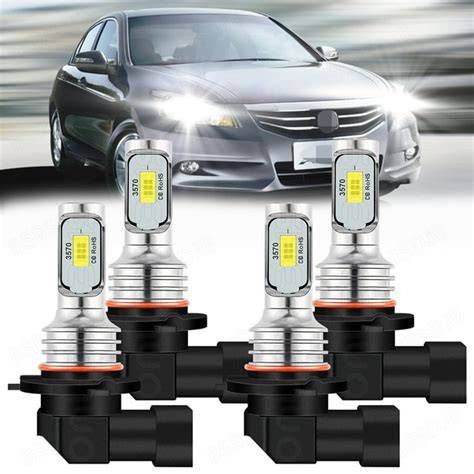 High-angle shot of Honda Accord (V) with newly installed LED headlights glowing brightly