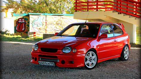 Toyota Corolla G6R Sunburst Red színben