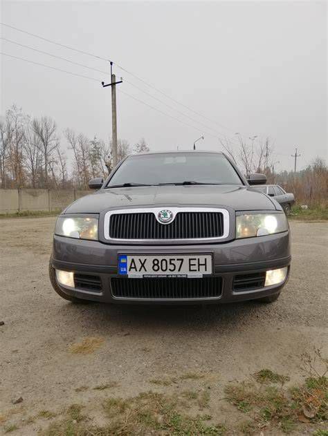 Skoda Superb Mk1 első központi kartámasz tárolórekesszel